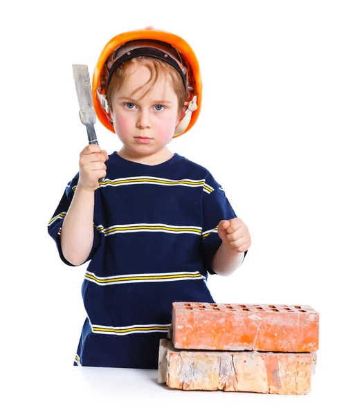 Junge mit Hut und Ziegelstein — Stockfoto