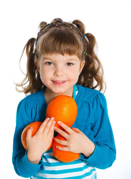 Portrait of happy girl with oranges — Stock Photo, Image