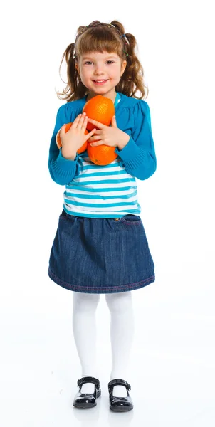 Menina feliz com laranjas — Fotografia de Stock