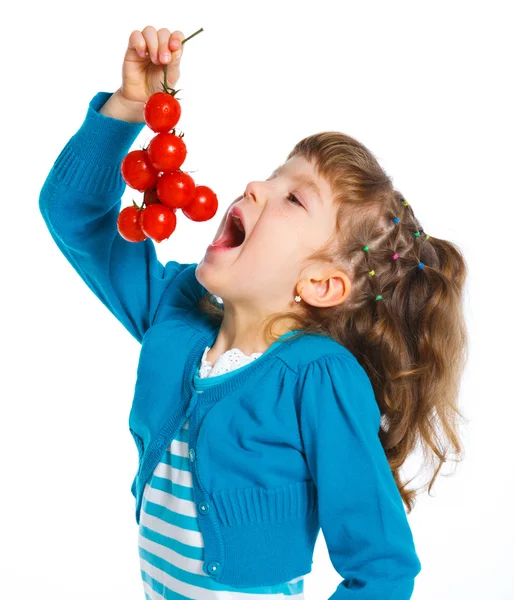 Girl with cherry tomatoes — Stock Photo, Image