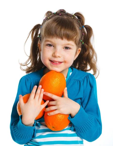 Happy girl with oranges — Stock Photo, Image