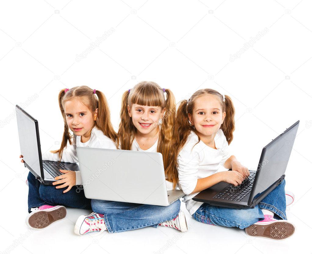 Three attractive girl using a laptop