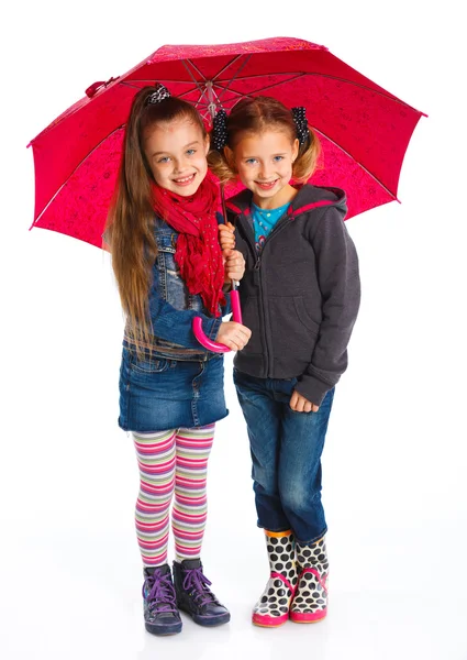 Duas meninas bonitas com guarda-chuva — Fotografia de Stock