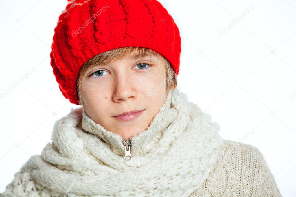 Portrait of young beautiful boy in winter style