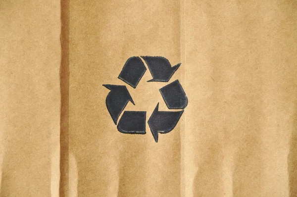Pappe und Recyclingschild — Stockfoto