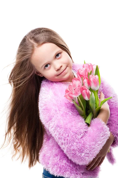 Bella bambina con bouquet di tulipani rosa isolati su bianco — Foto Stock