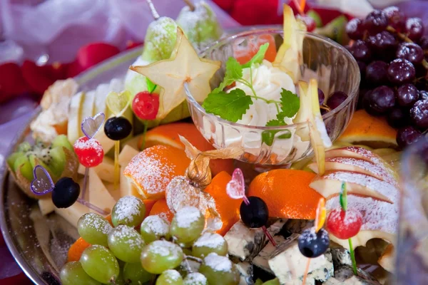 stock image Festive dish with fruit, cheese and sauce