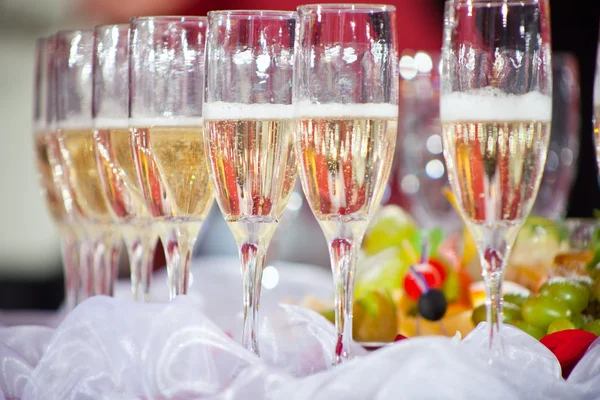 Glasses of champagne on festive table — Stock Photo, Image