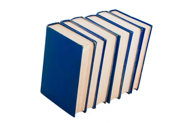 Hromádky knih izolovaných na bílém — Stock fotografie