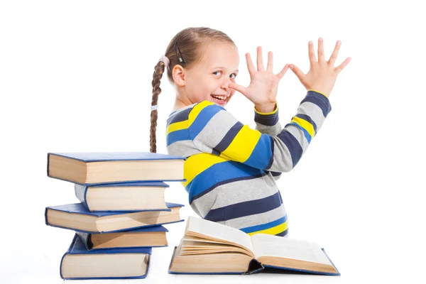 Écolière avec des livres taquinés sur blanc isolé — Photo