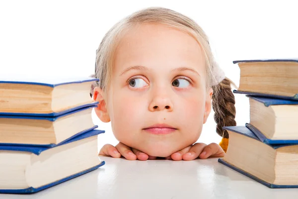 Girl choosing the books on isolated white — Stock Photo, Image