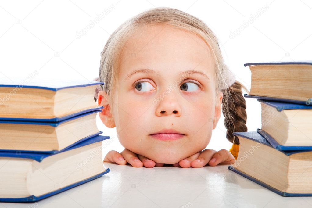 Girl choosing the books on isolated white