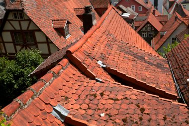 Charming red roof of German houses clipart