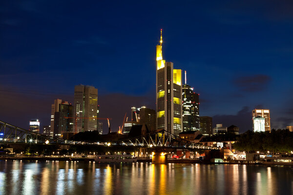 Frankfurt am Main city and river Main in Germany at night
