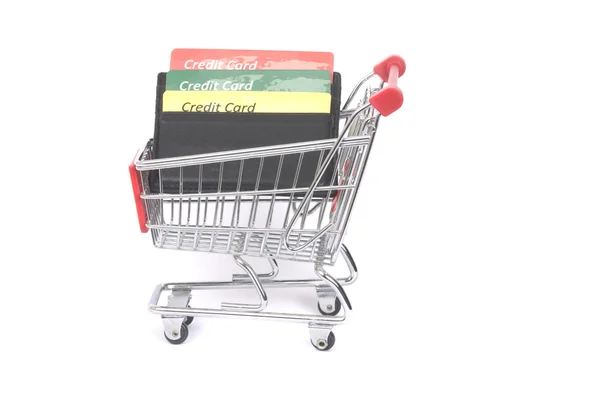 Credit cards and shopping trolley — Stock Photo, Image