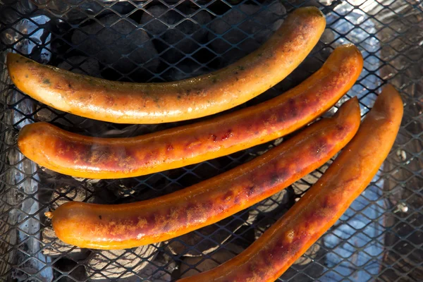 Grilling sausages — Stock Photo, Image