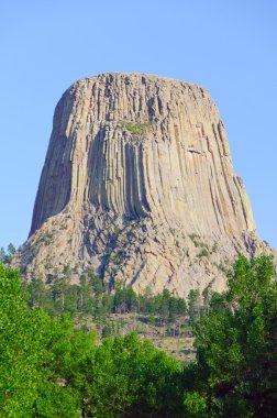 Morning Light on a Devils Tower clipart