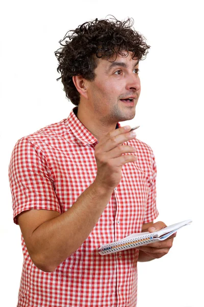 Man with a pencil and notebook — Stock Photo, Image