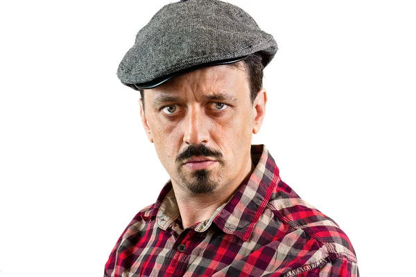 Serious man with a cap — Stock Photo, Image