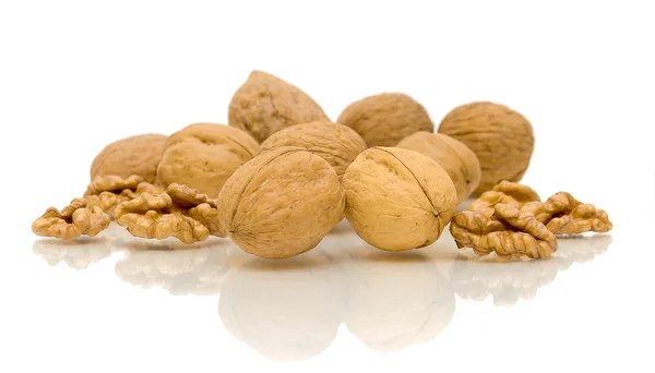 A handful of walnuts on white background — Stock Photo, Image