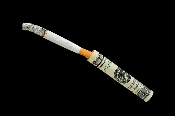 Cigarette and 100 dollars on a black background — Stock Photo, Image