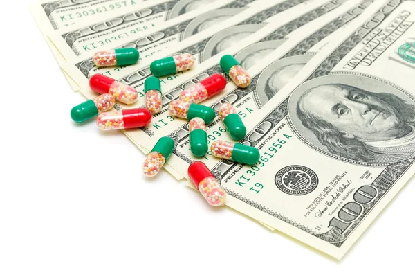 Drugs and U.S. dollars on a white background — Stock Photo, Image