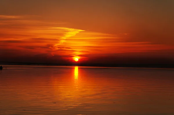 stock image Red sunset over river