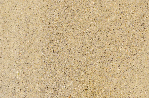 Sand close up as textured background — Stock Photo, Image