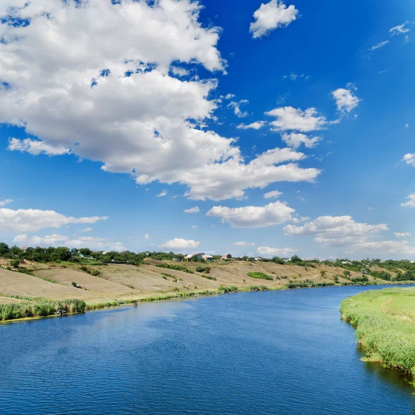 Clouds over river — Stock Photo, Image
