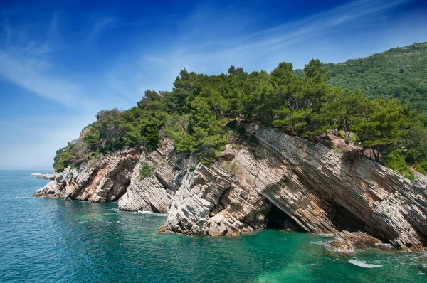 stock image Layered Rocks and clear Sea