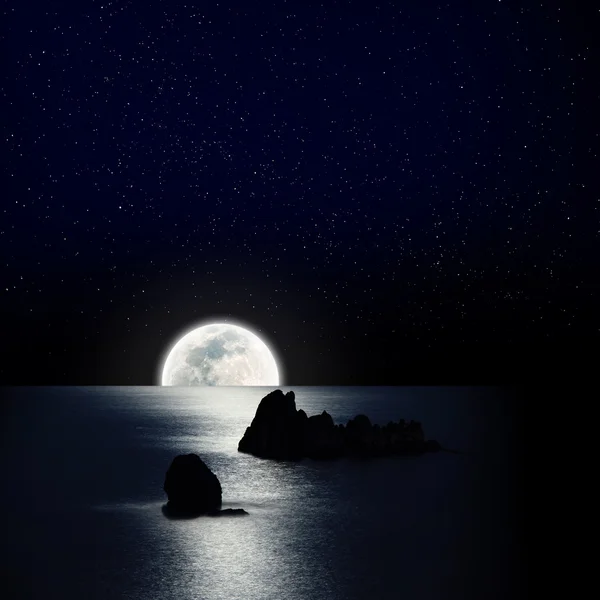 stock image The moon rise up over the ocean