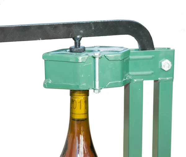 stock image Bottle Capper and wine bottle (closeup view)