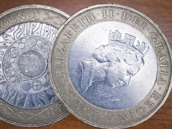 Close up van Britse valuta - 2 kilo munten — Stockfoto