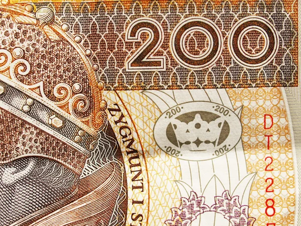 Primer plano de la moneda polaca - billete de 200 zloty —  Fotos de Stock