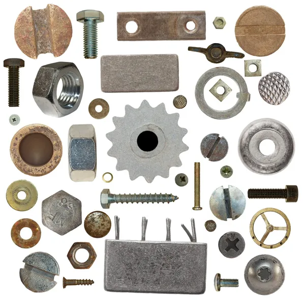Sammlung alter Schraubenköpfe, Zahnräder, alter Meta, Schrauben, Stahlmuttern, alter Metallnagel, isoliert auf weißem Hintergrund — Stockfoto