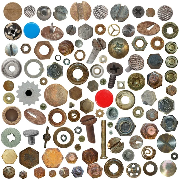 大集合旧生锈的螺丝头、 螺栓、 钢螺母、 旧金属钉钉、 图钉 — 图库照片