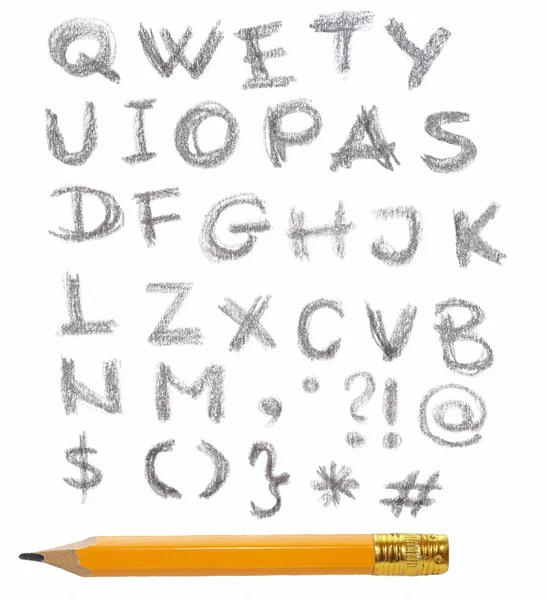 Ręcznie napisane litery alfabetu i drewniany długopis na białym tle — Zdjęcie stockowe