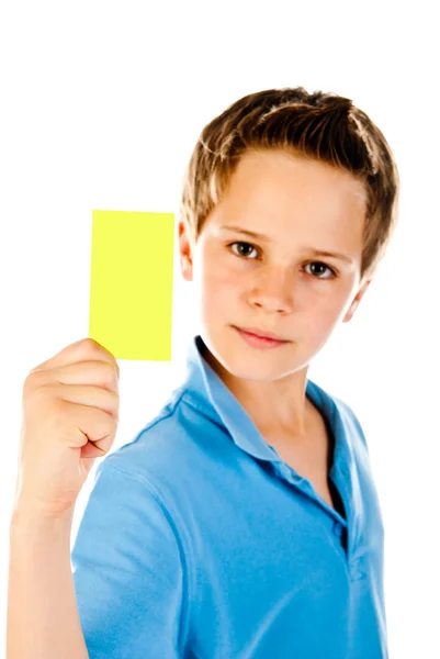 Niño con tarjeta amarilla —  Fotos de Stock
