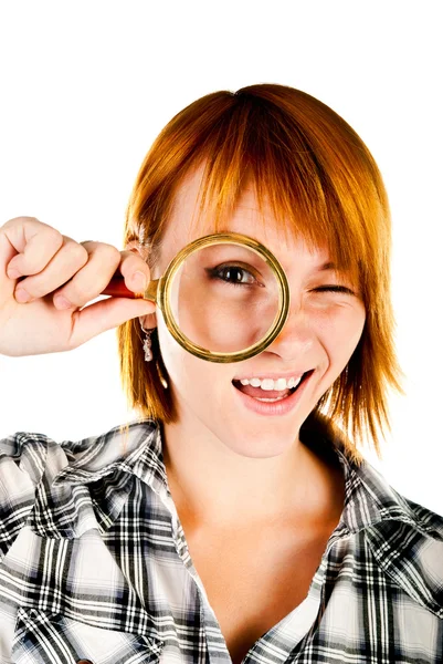 Woman with magnifying glass Stock Image