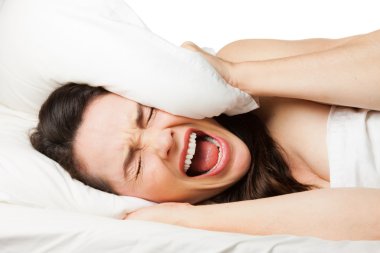 Frustrated woman trying to sleep clipart