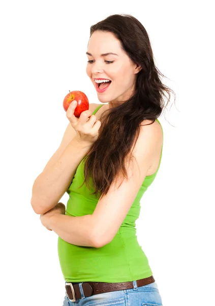 Glückliche junge Frau mit Apfel in der Hand — Stockfoto
