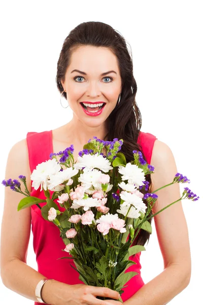 Zaskoczony, kobieta trzyma kwiaty — Zdjęcie stockowe