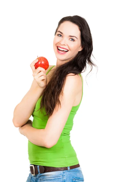 Щаслива красива жінка тримає яблуко — стокове фото