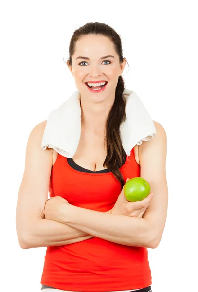 Молода щаслива жінка тримає яблуко — стокове фото