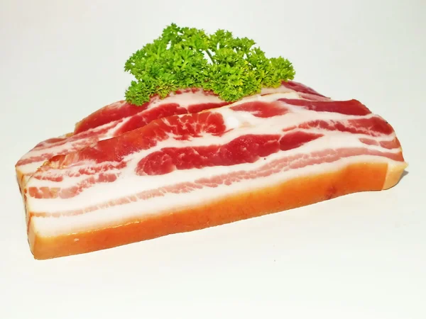 Prosciutto skuren i tärningar bacon i närbild — Stockfoto
