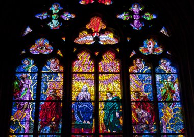 Stained glass windows at cathedral in Prague clipart