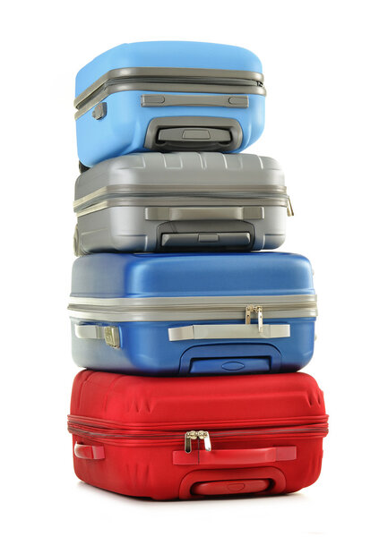 Luggage consisting of polycarbonate suitcases isolated on white