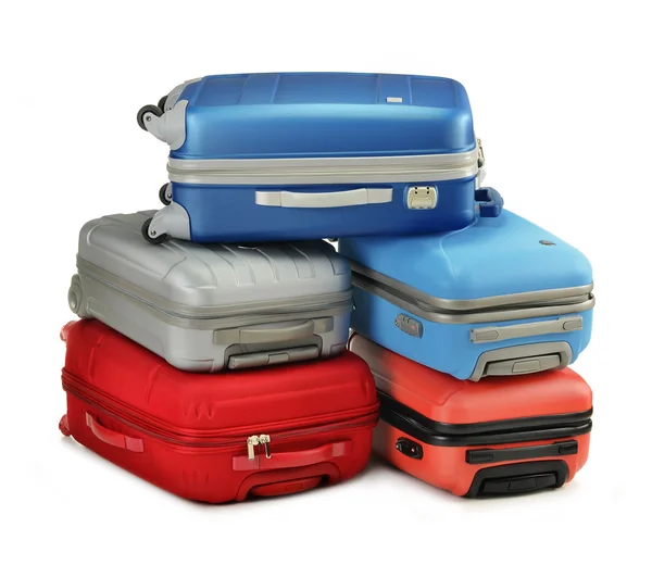 Bagagli costituiti da valigie in policarbonato isolate su bianco — Foto Stock