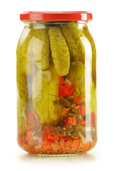 Jar of pickled cucumbers. Marinated food. Stock Image