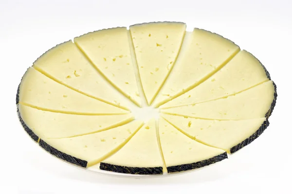 Несколько ломтиков сыра манчего — стоковое фото